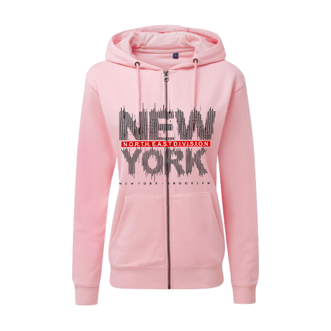 Woman in a pink zip-up hoodie, black pants, with 