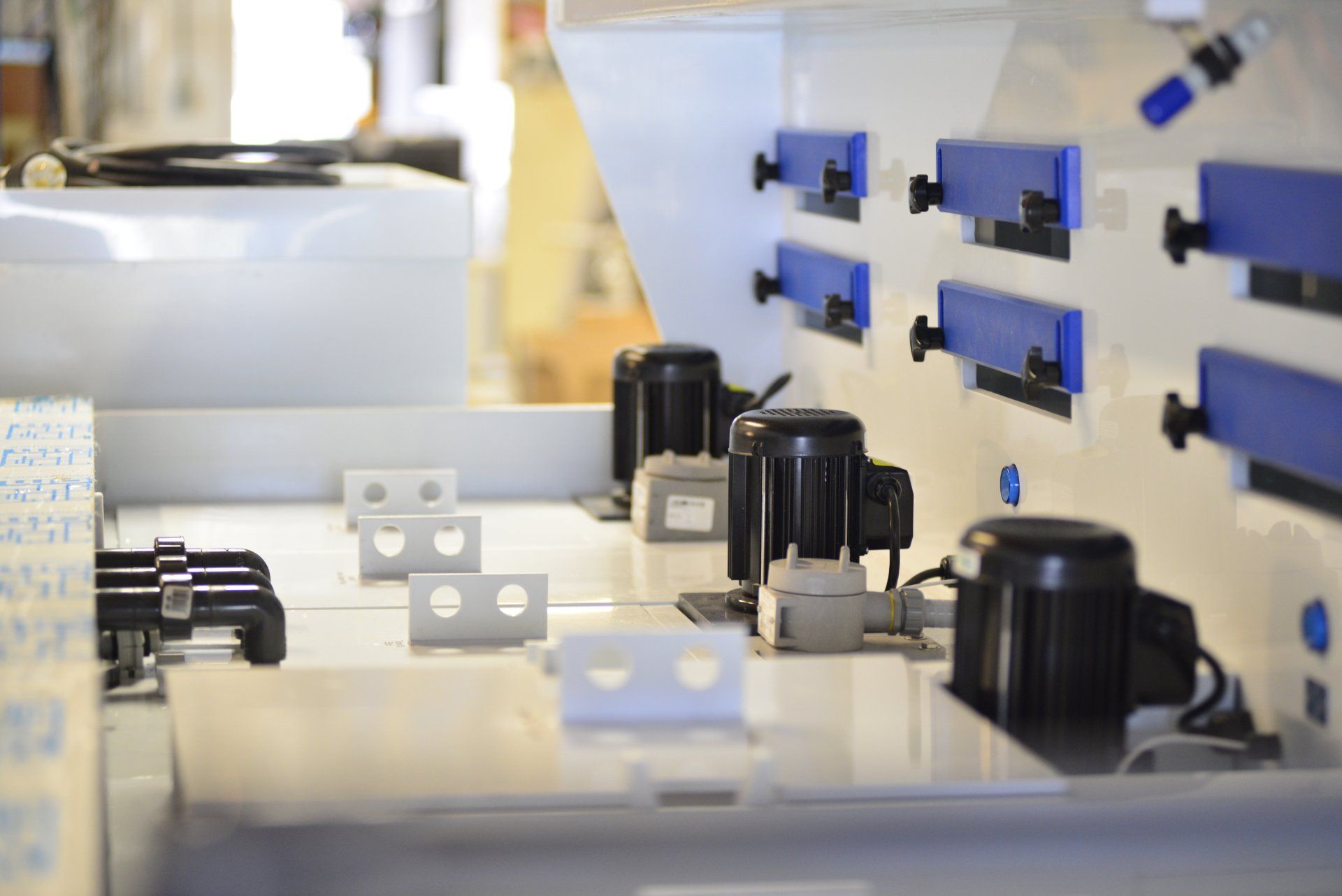 A close up of a machine with a lot of parts on it.