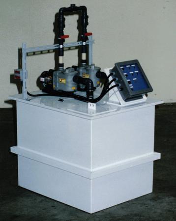 A white box with a monitor on top of it