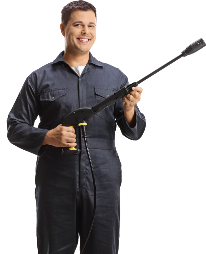 Full length portrait of a worker with a pressure washer machine
