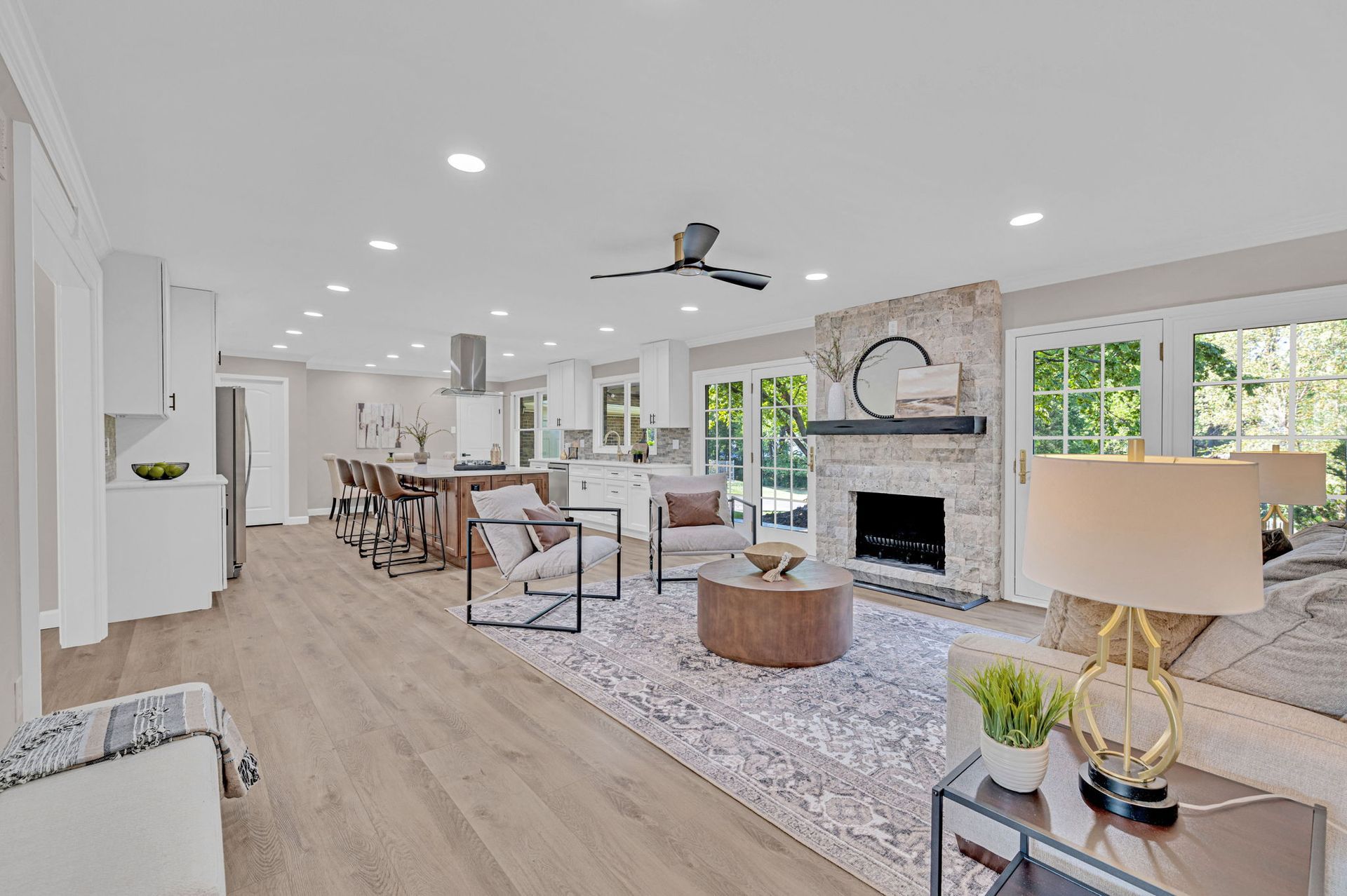 A living room filled with furniture and a fireplace.