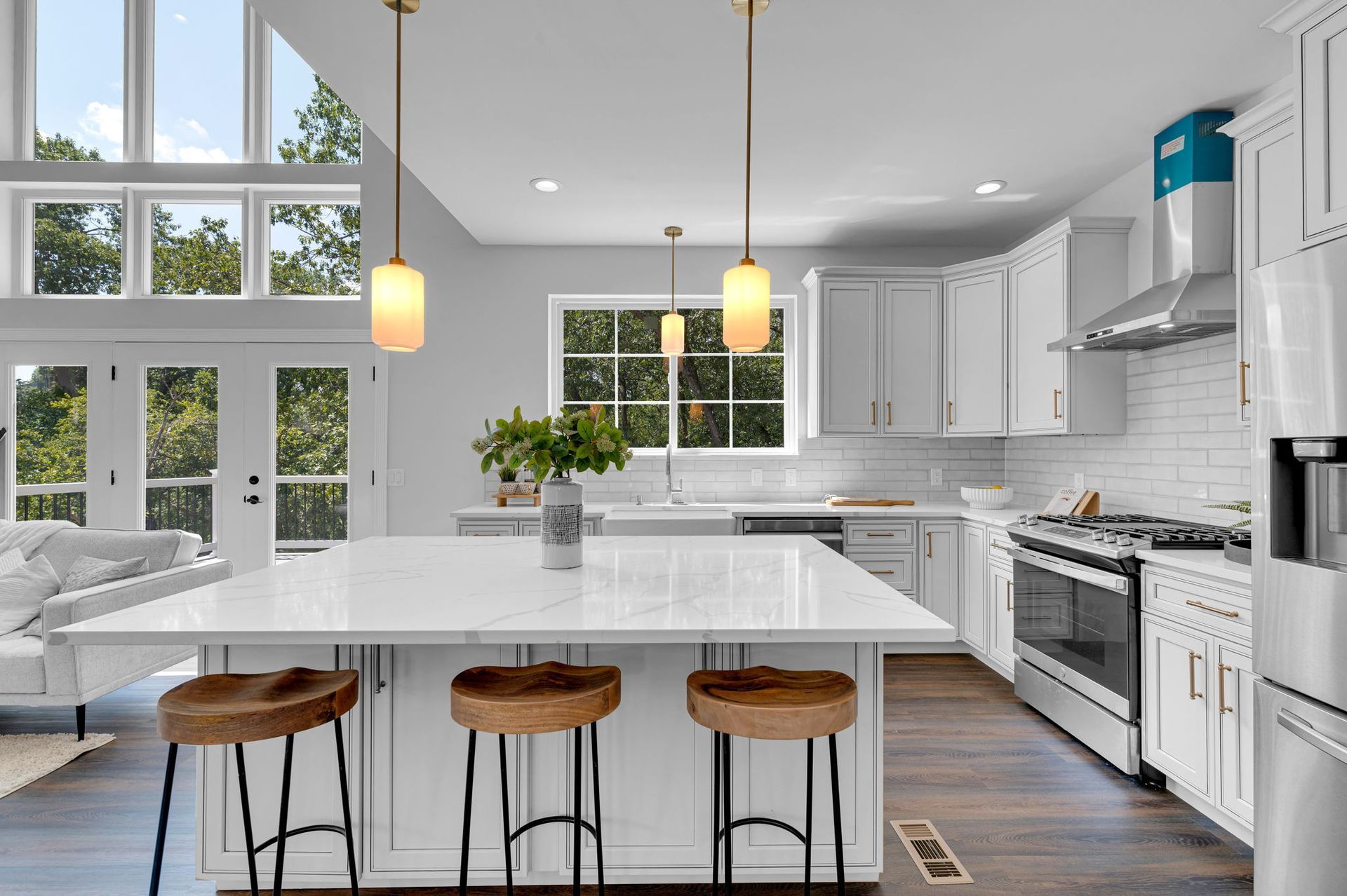 There is a large island in the middle of the kitchen.