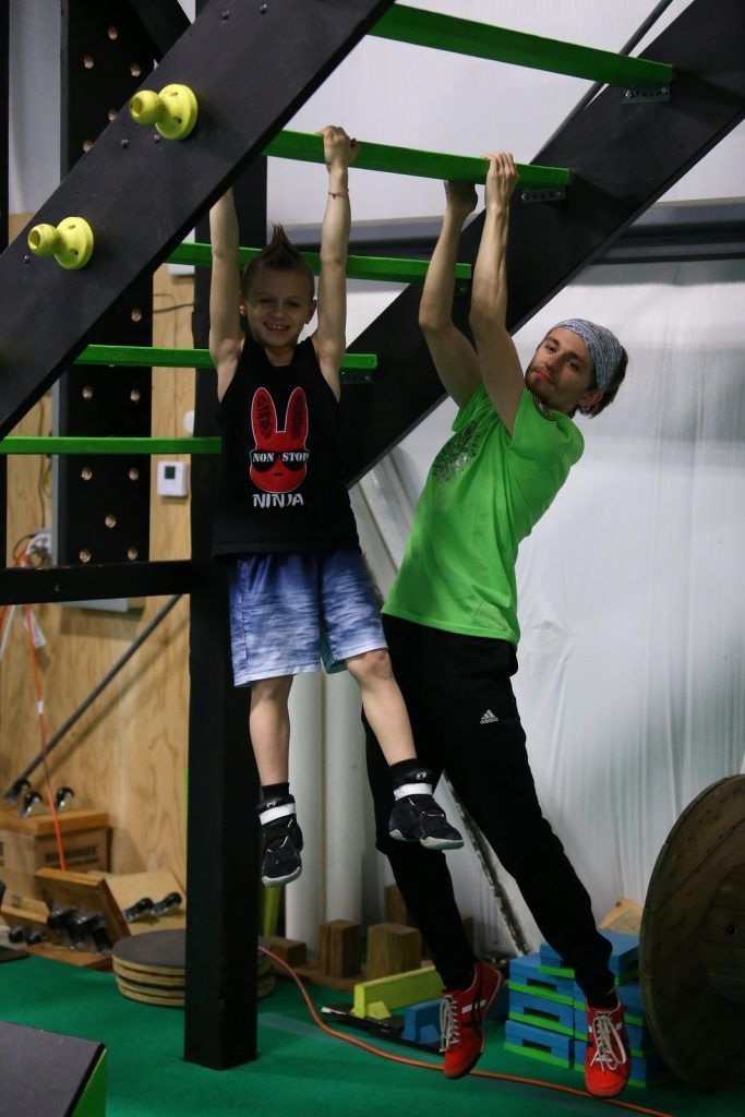 Instructor and young athlete 