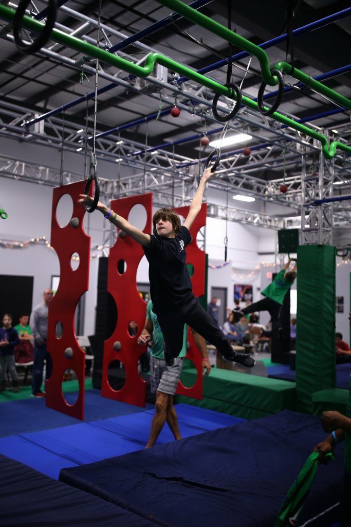 Young boy on the rings