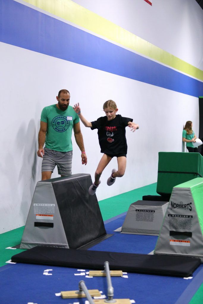 Instructor and young girl on course