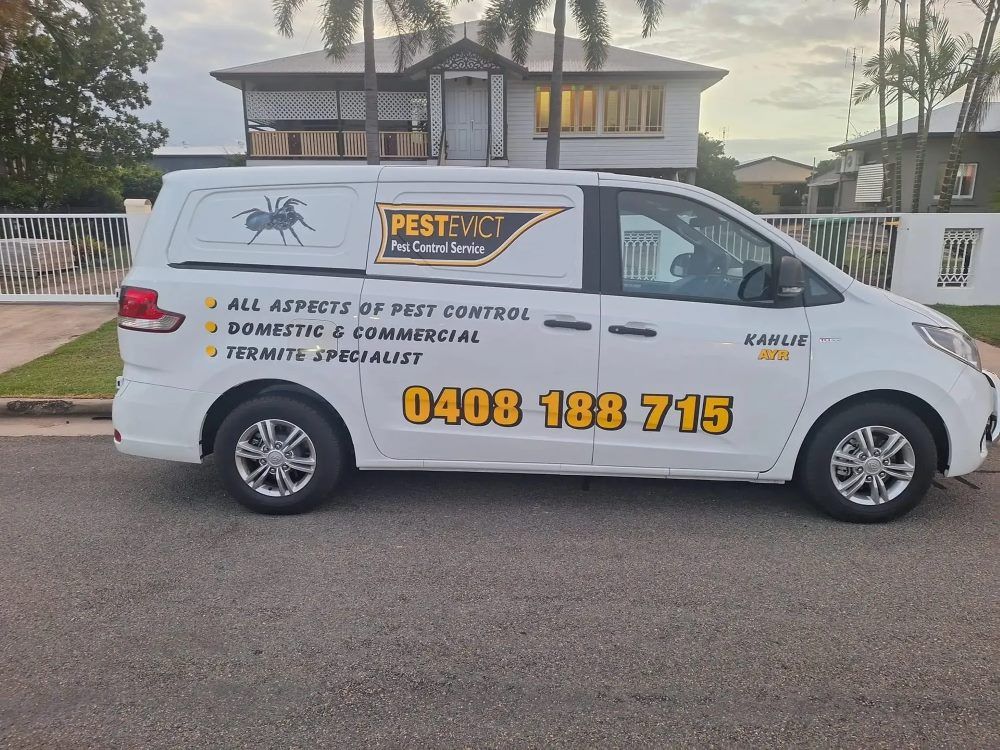 A White Van Is Parked In Front Of A House — Pest Evict Pest Control in Ayr, QLD