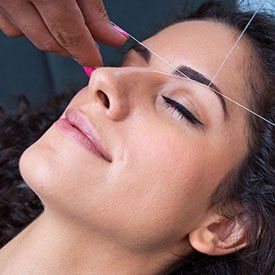 Woman Having Facial Threading — Tucson, AZ — Dalina’s Threading & Skincare