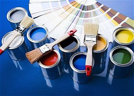 paint swatches, open paint cans and paintbrushes