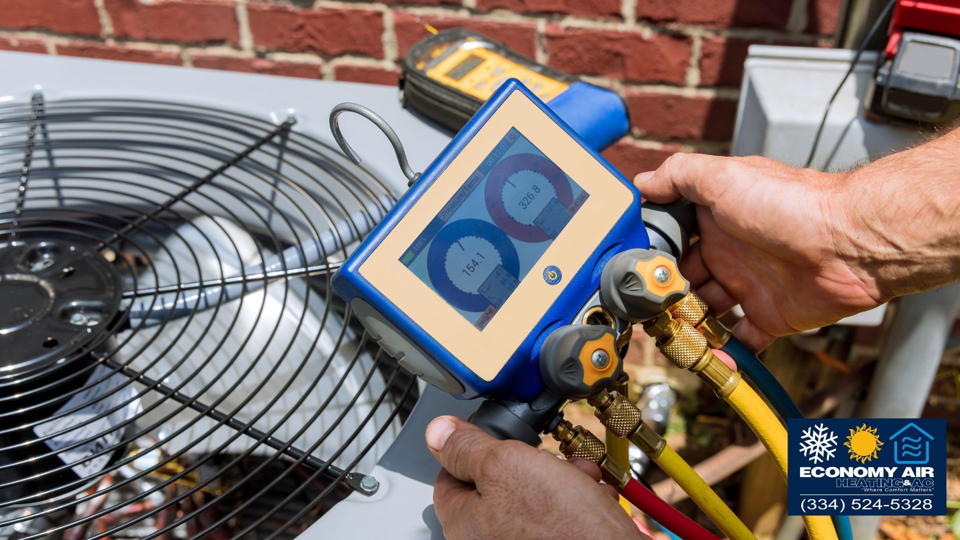 A person is holding a device in front of an air conditioner.