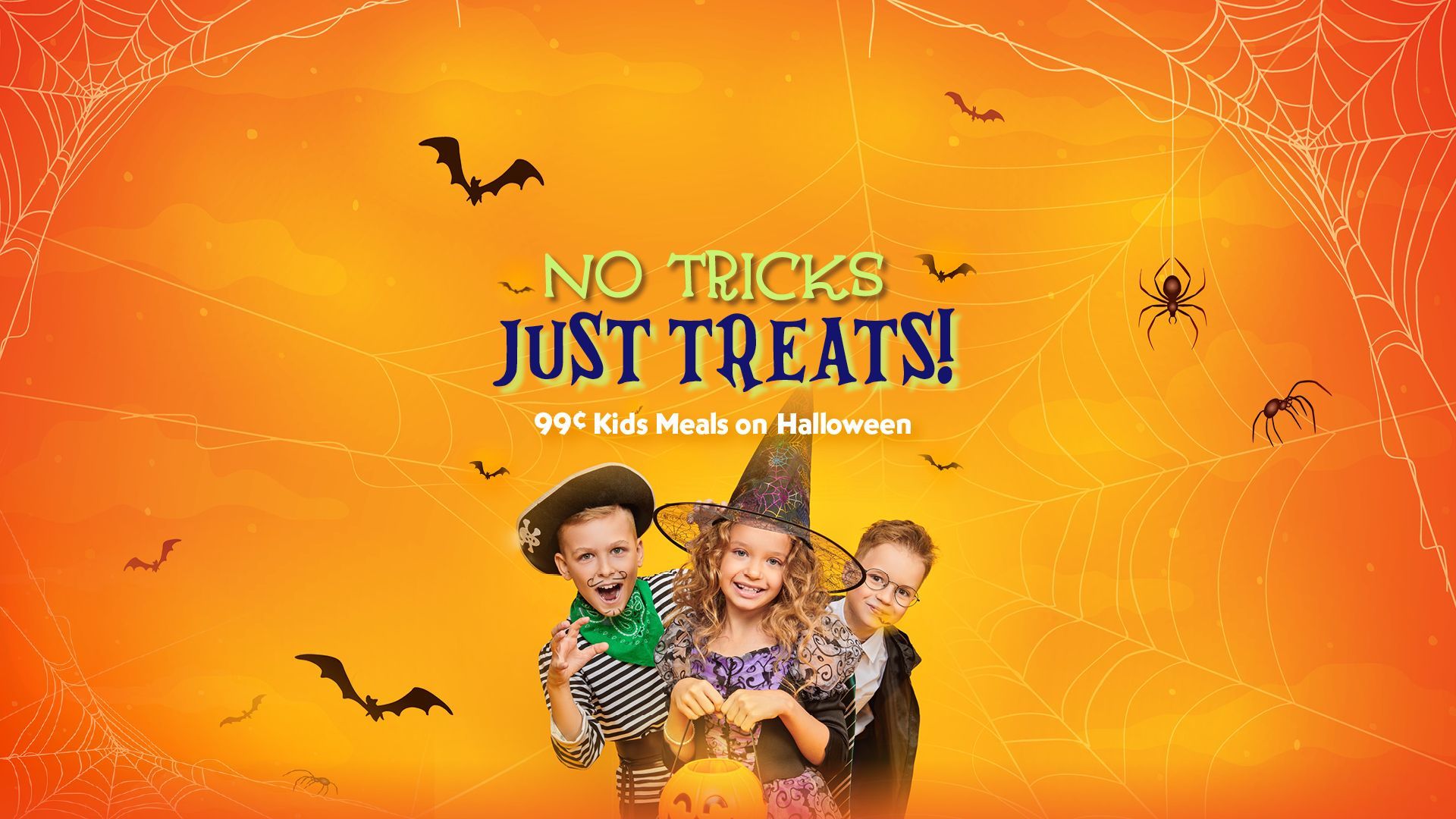 Three kids in Halloween costumes smiling with