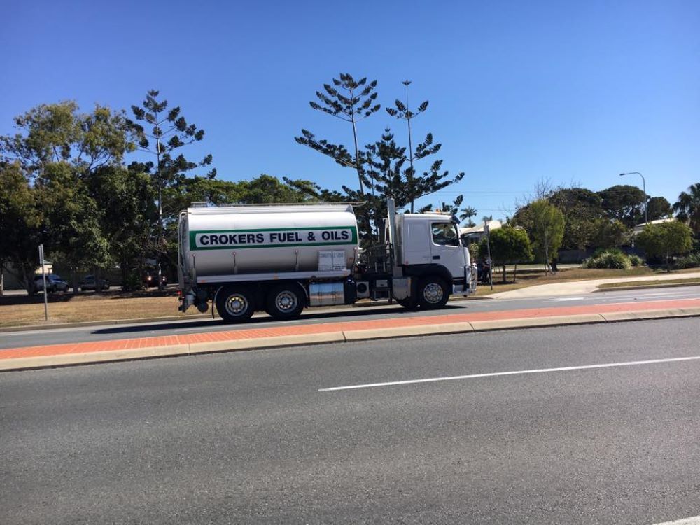 A Fuel and Oil Truck is Parked on the Side of the Road — Crokers Fuel & Oils Pty Ltd in Paget, QLD