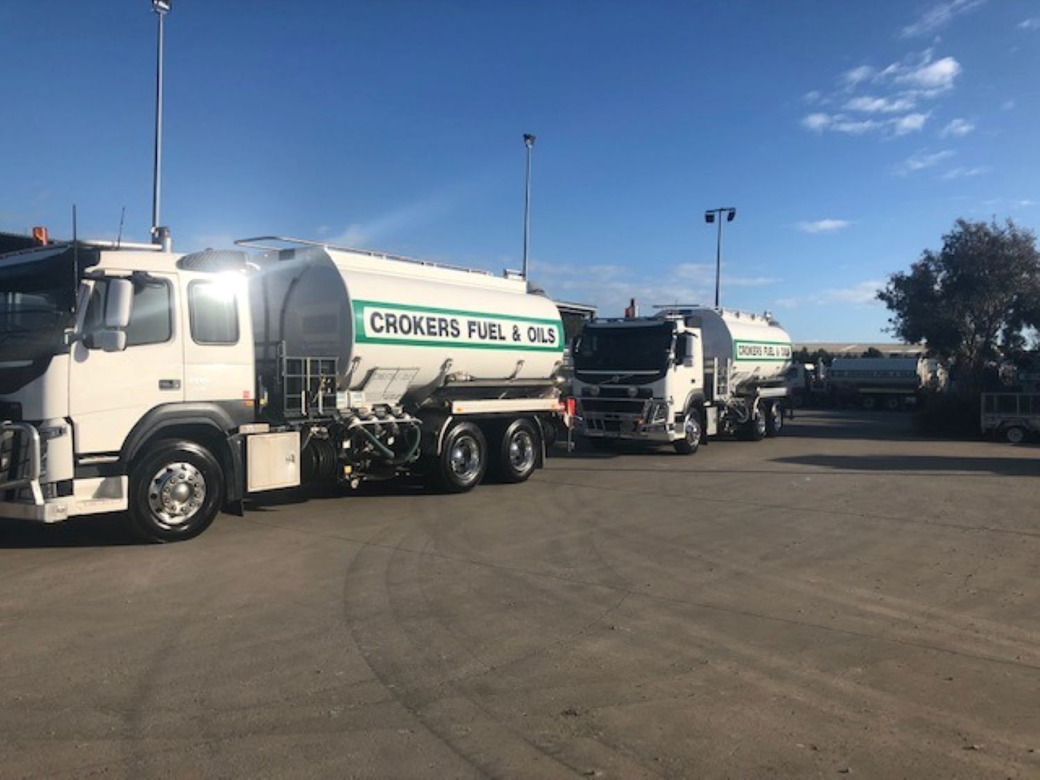 2 trucks driving behind each other — Crokers Fuel & Oils Pty Ltd in Paget, QLD