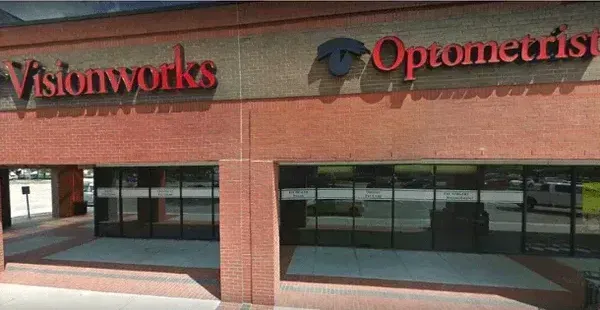 A brick building with the word visionworks on it