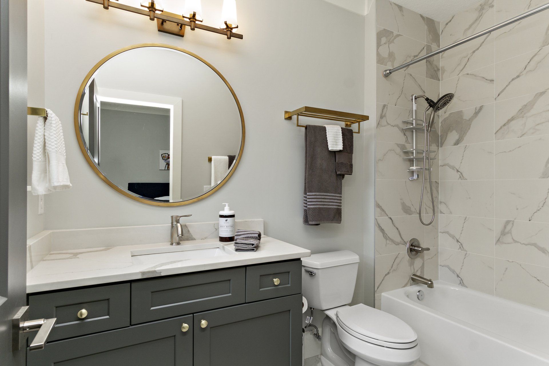 White and gray bathroom — Blaine, MN — Walsh Plumbing Inc.