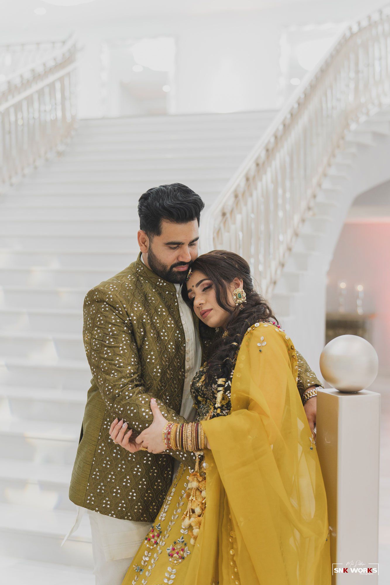 bride and groom of an Indian wedding taking photos in Fairfax, VA at CrystalView Weddings and Events