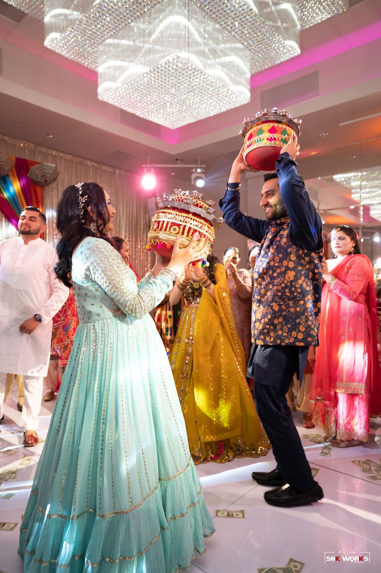 traditional dancing at an Indian wedding in Fairfax, VA at CrystalView Weddings and Events