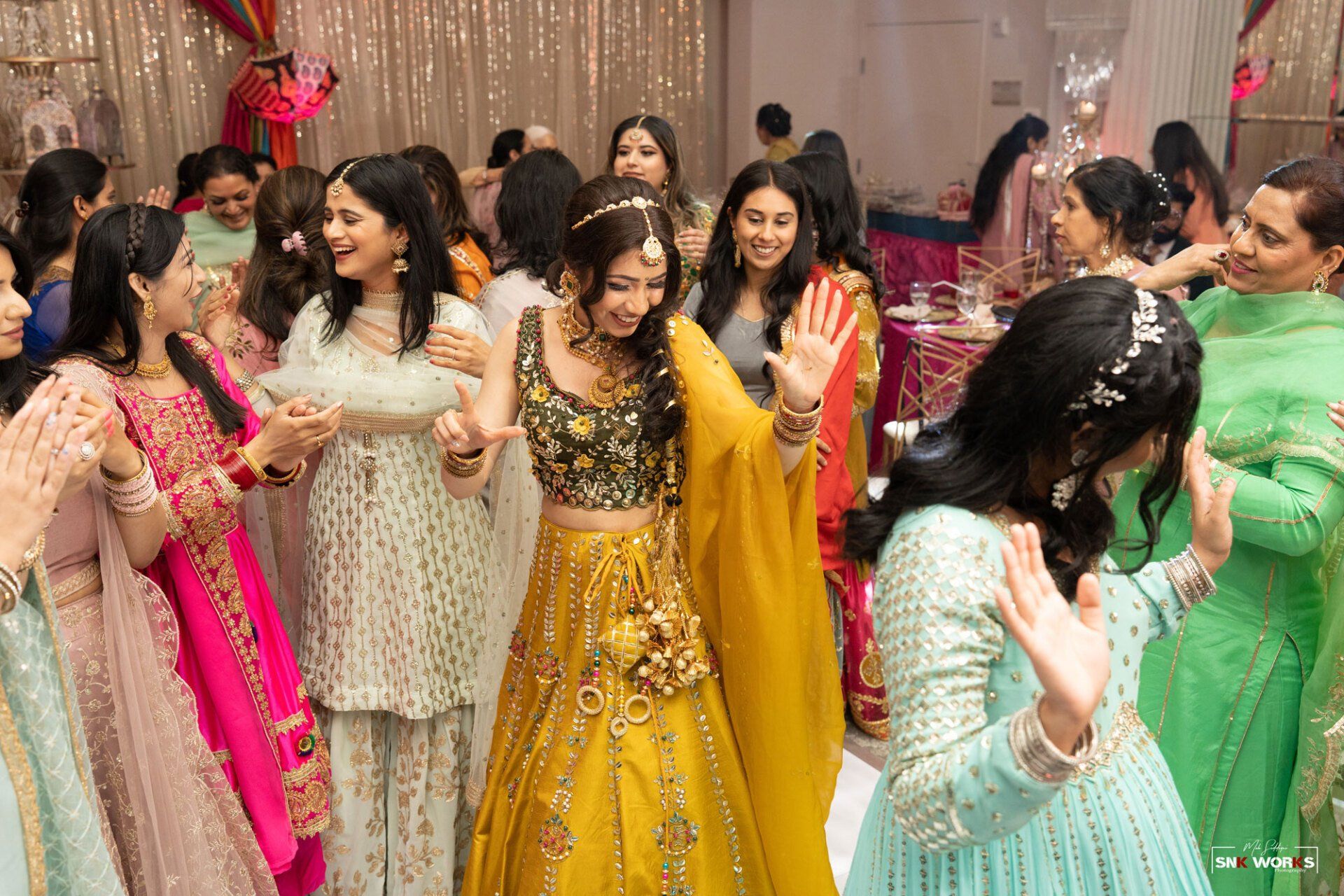 people dancing at an Indian wedding in Fairfax, VA at CrystalView Weddings and Events