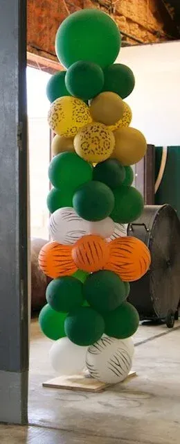 A balloon column with green, yellow, white and orange balloons, likely for an Indian Independence Day celebration.