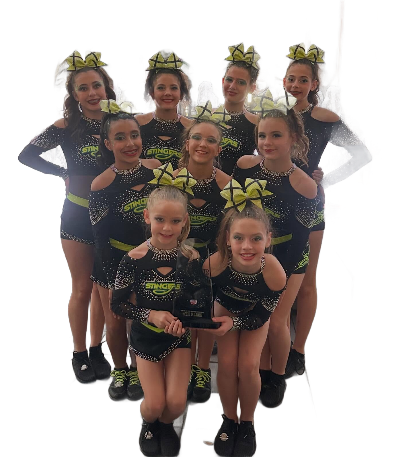 Cheerleading squad in black uniforms with teal accents, posing with rubber ducks.