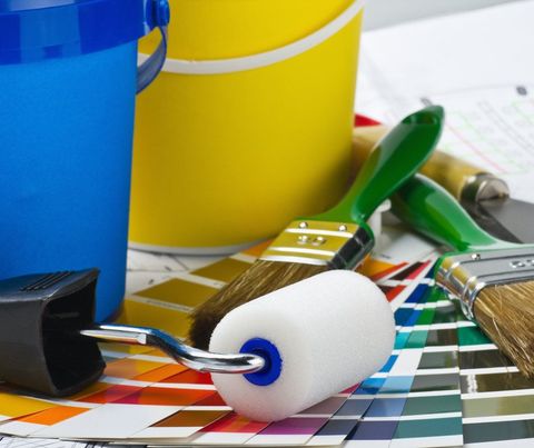 colour swatches, paint roller, buckets and paint brushes