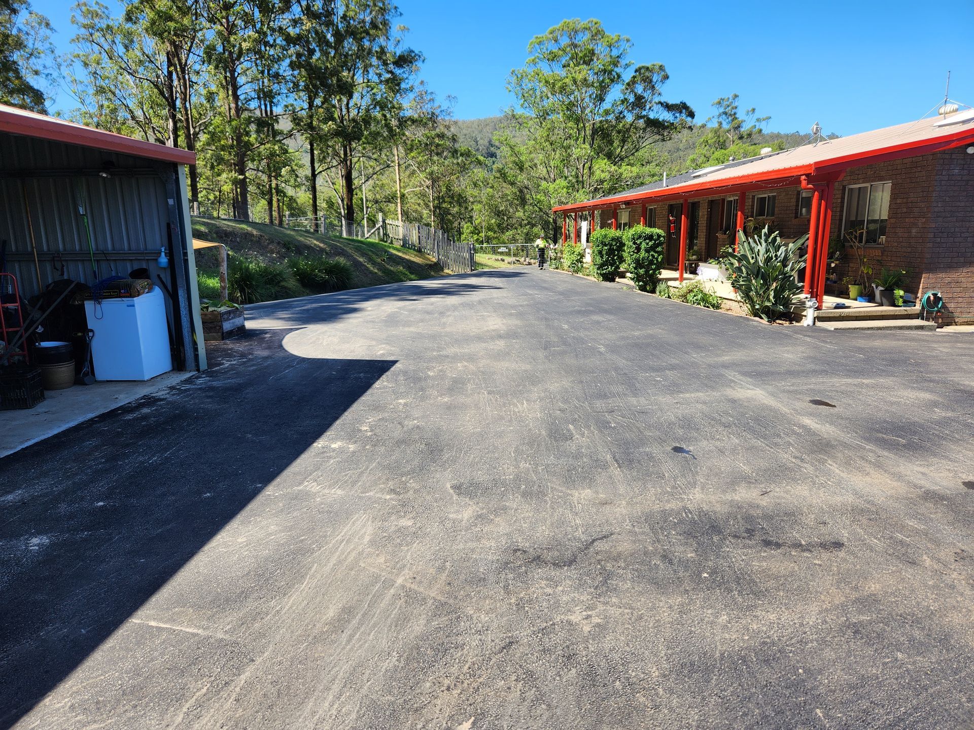 Asphalt Driveway In A Rural Setting — TAC Asphalt Services in Warners Bay, NSW