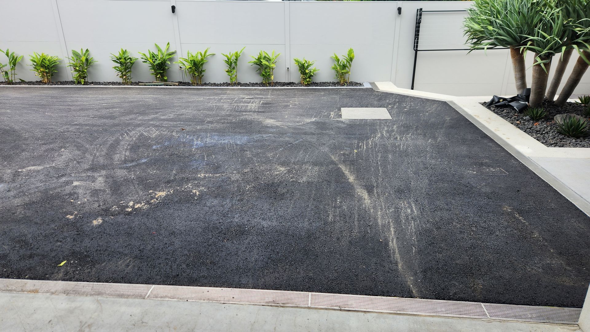 Black Asphalt Driveway — TAC Asphalt Services in Warners Bay, NSW