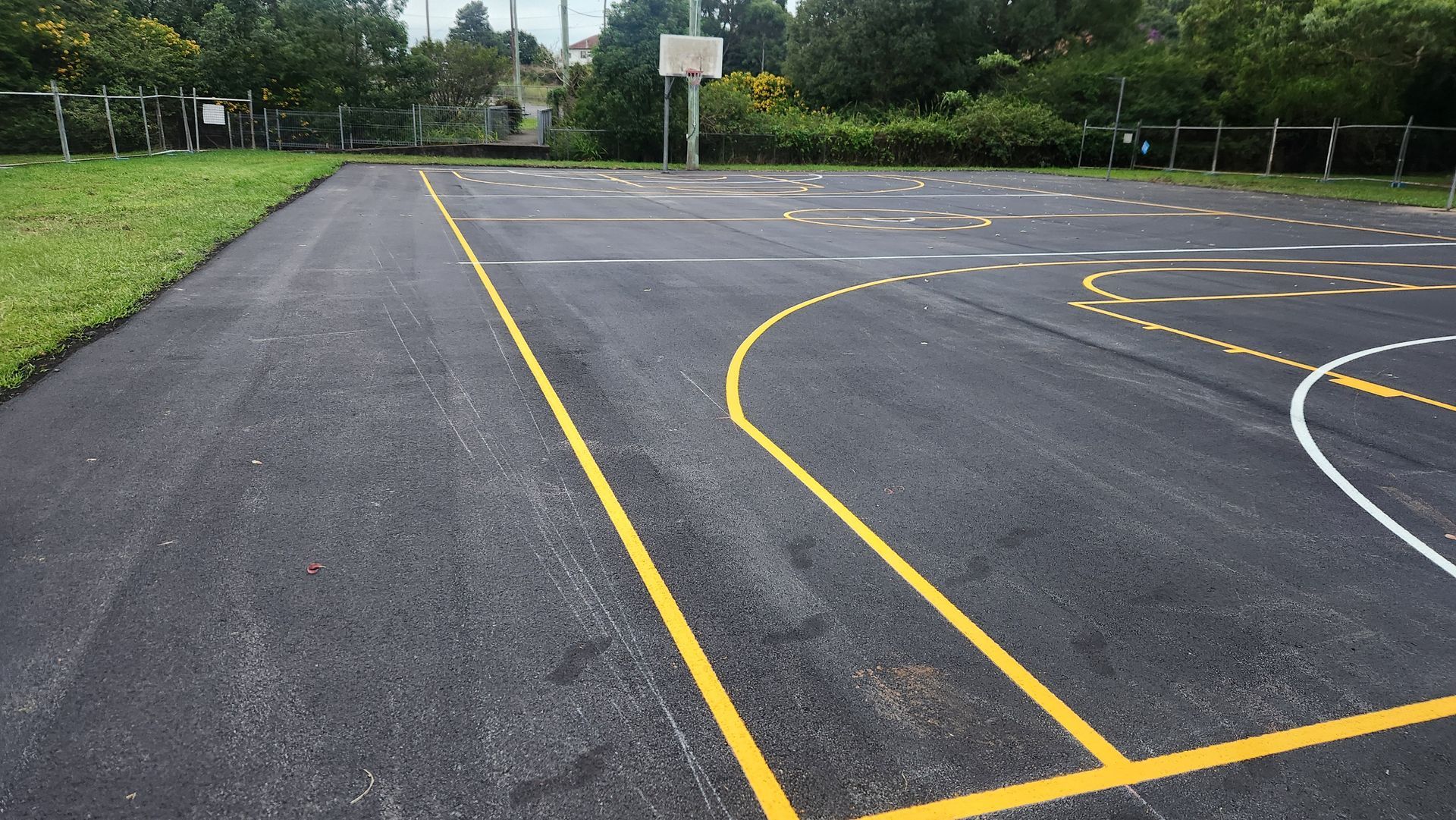 Asphalt Playground With Yellow and White Painted Lines for Games — TAC Asphalt Services in Hunter Valley, NSW