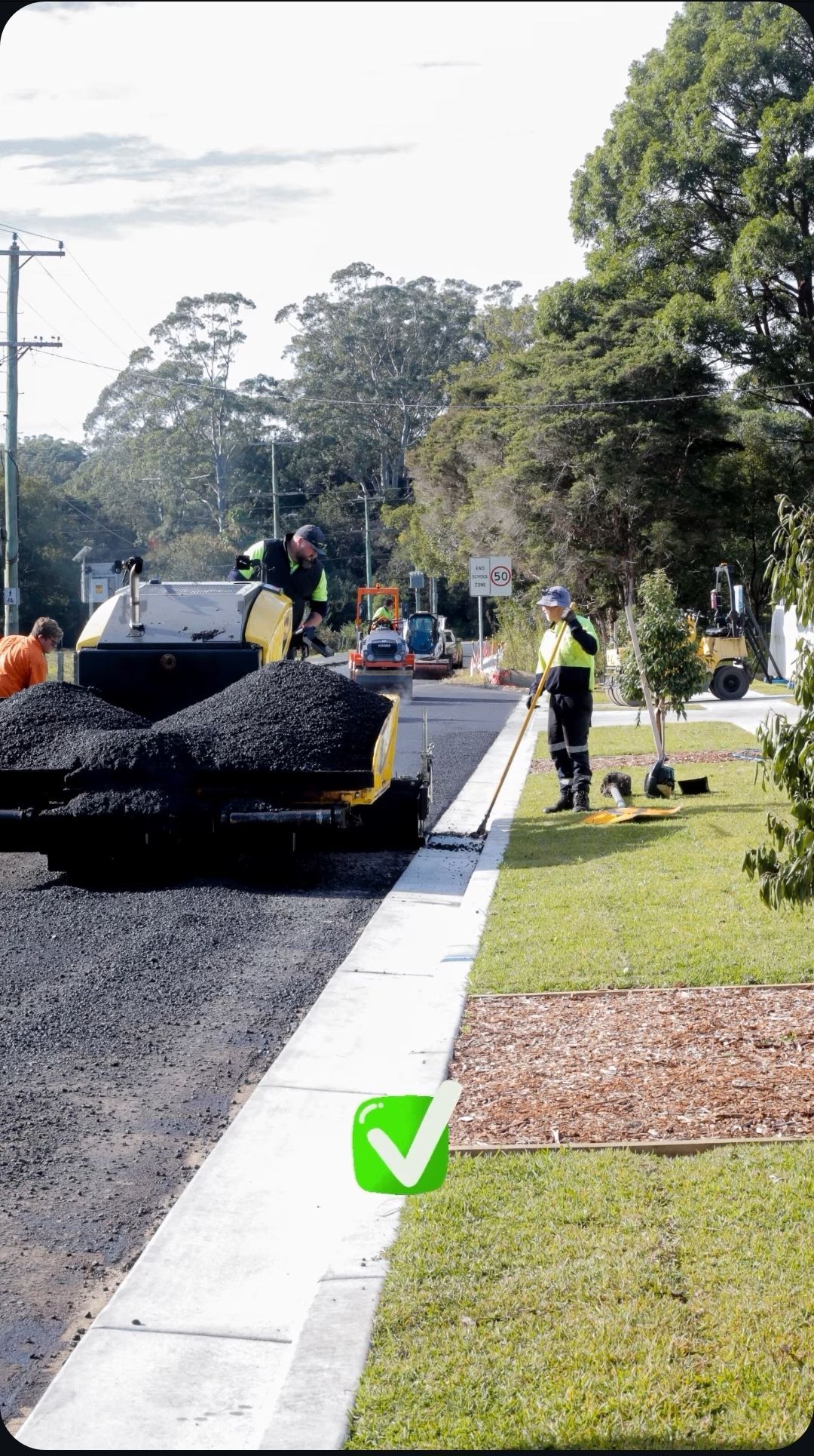 Road Workers Paving A Street — TAC Asphalt Services in Warners Bay, NSW