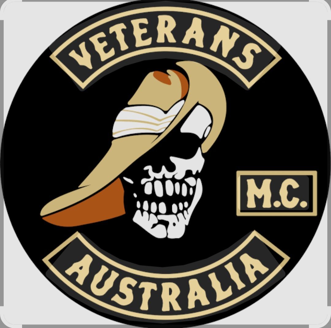 A black circular emblem featuring a white skull wearing a tan slouch hat, with 