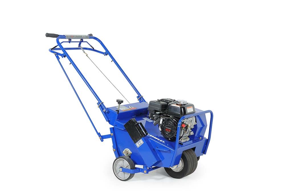 A blue lawn mower is sitting on a white surface.