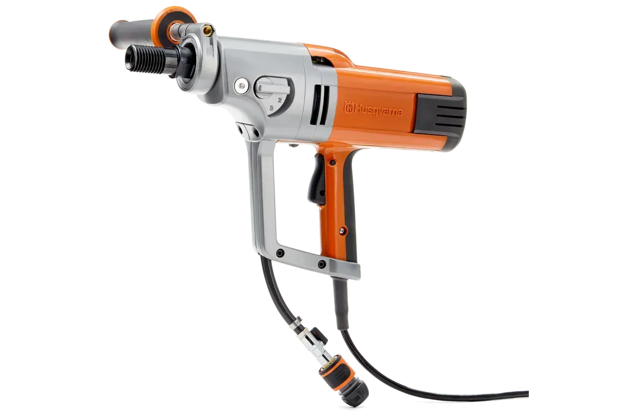 A close up of a drill with a cord attached to it on a white background.