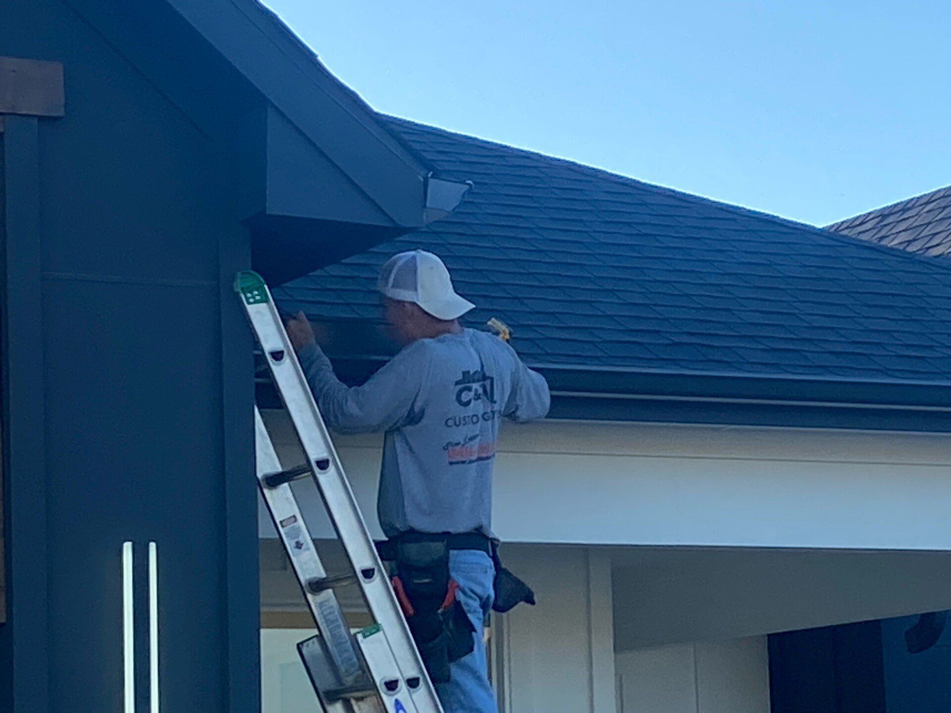 Man on Ladder — Krum, TX 76249 — C&W Custom Gutters Inc.