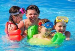 Happy Family in Pool - Town and Country Swimming Pools in Phillipsburg, NJ