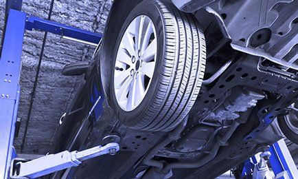 Car under repair — expert tire repair in Tampa Bay Area, FL