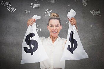 Businesswoman holding cash bags - Auto insurance in Huntington Beach, CA Businesswoman holding cash bags - Auto insurance in Huntington Beach, CA