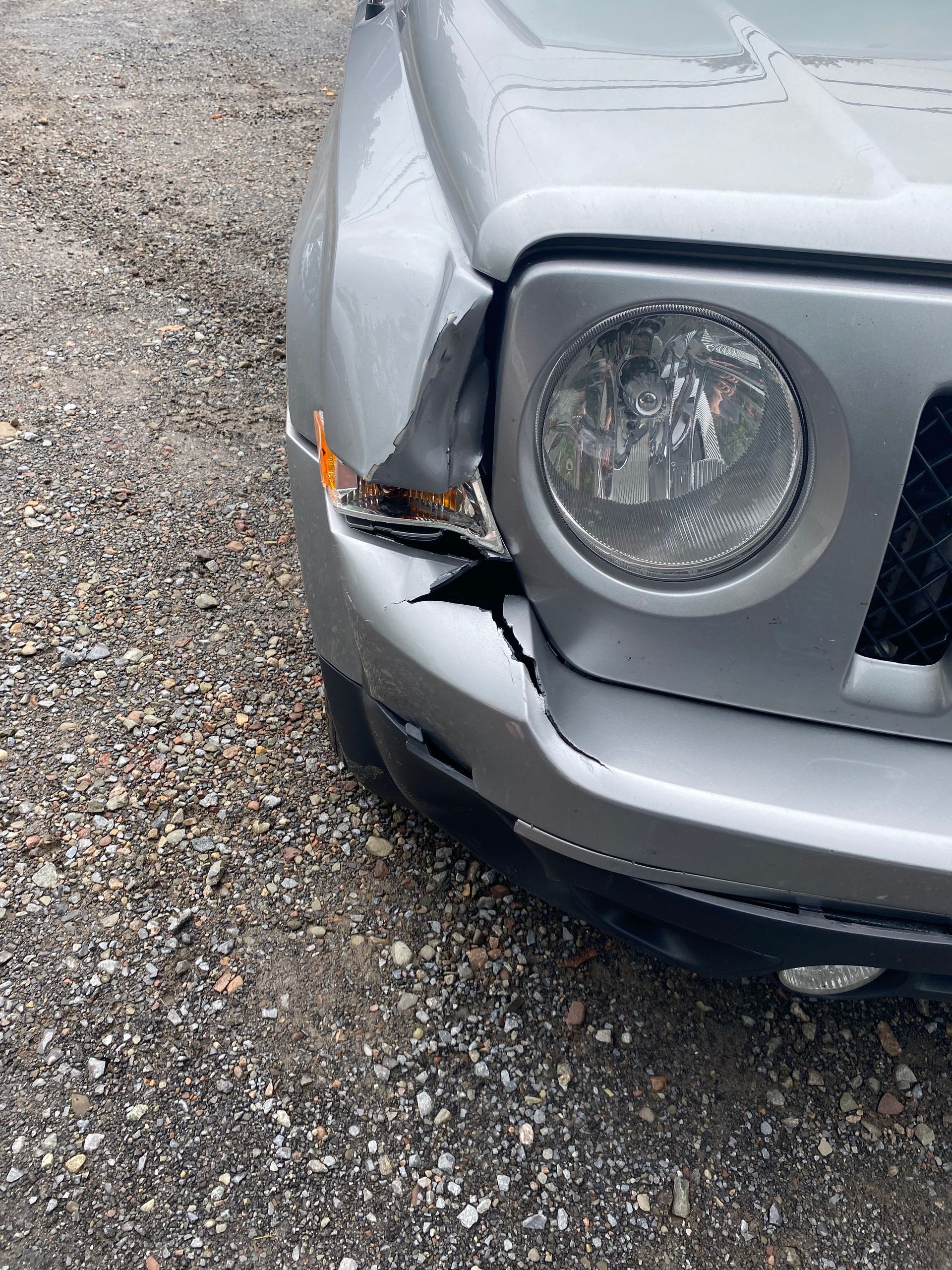 Front View Damaged Headlight — DM Collision — New Floyd Road Rome, NY