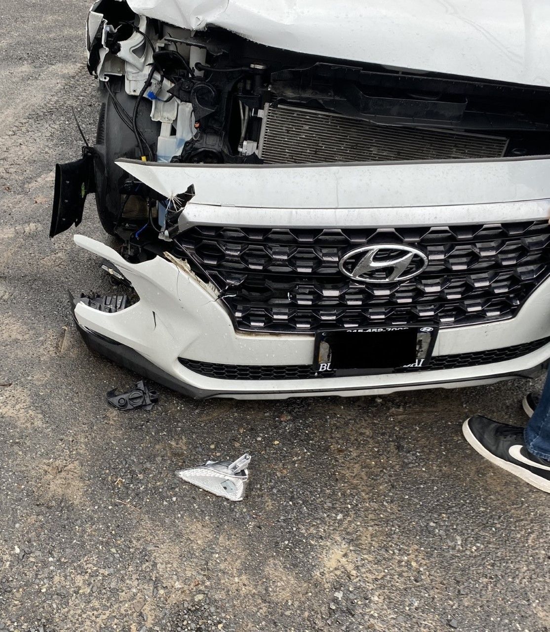 Top View Damaged Bumper of Car — DM Collision — New Floyd Road Rome, NY