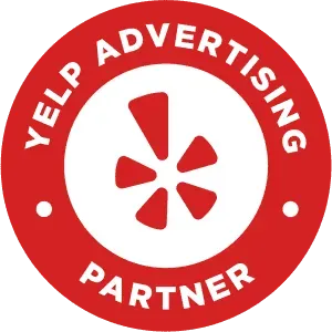 A yelp advertising partner badge with a star in the center