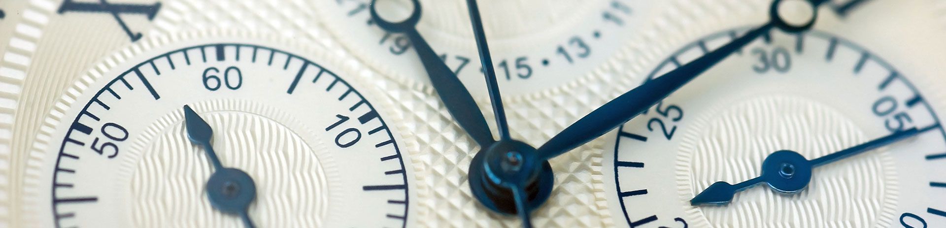 a close up of the face of a watch with the hands on the number 60