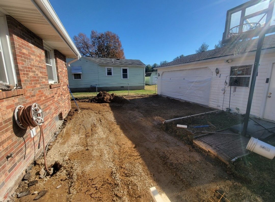 Before Concrete Driveway — Evansville, IN — CMC Remodeling