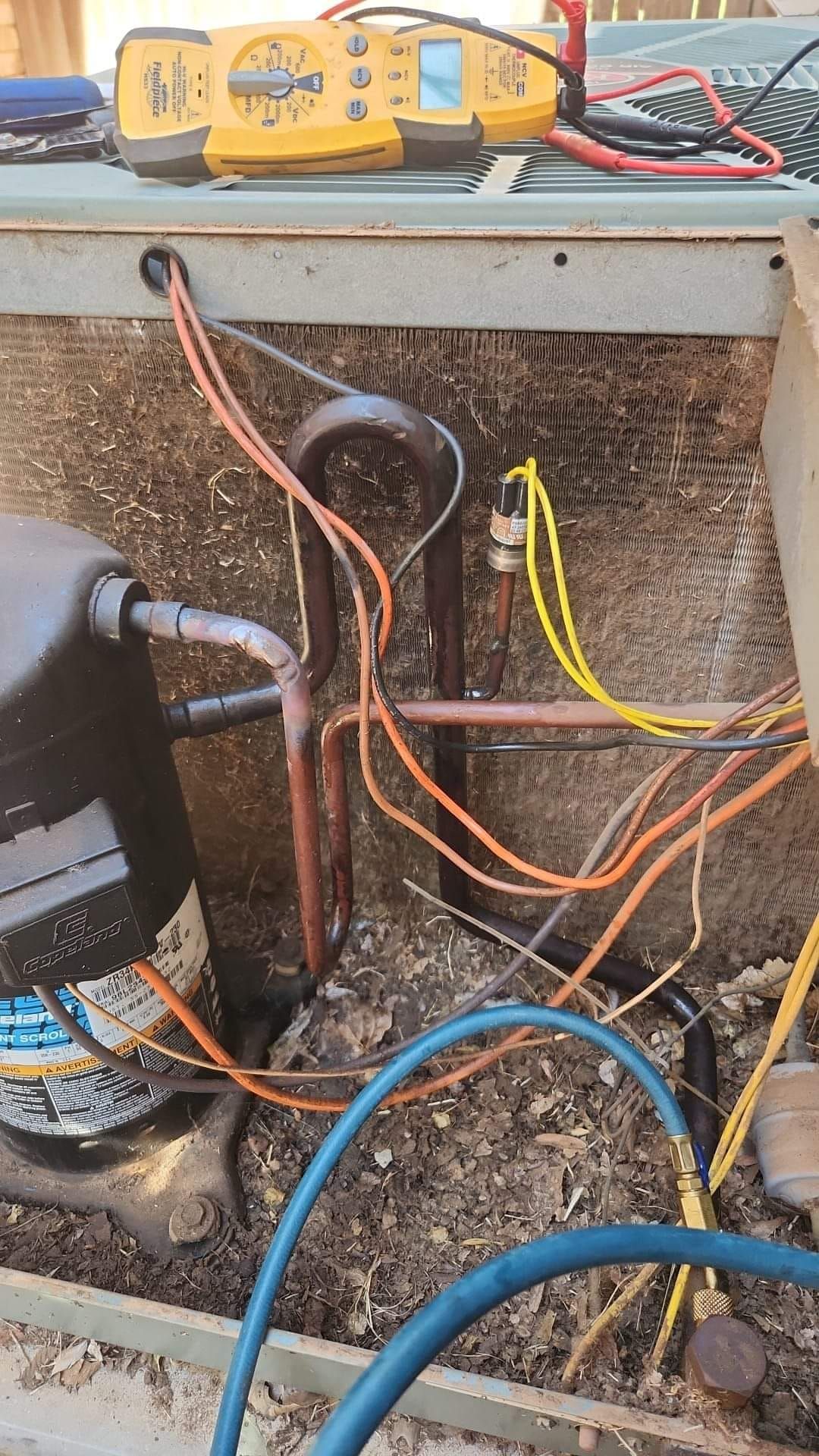A bunch of wires are connected to a machine.