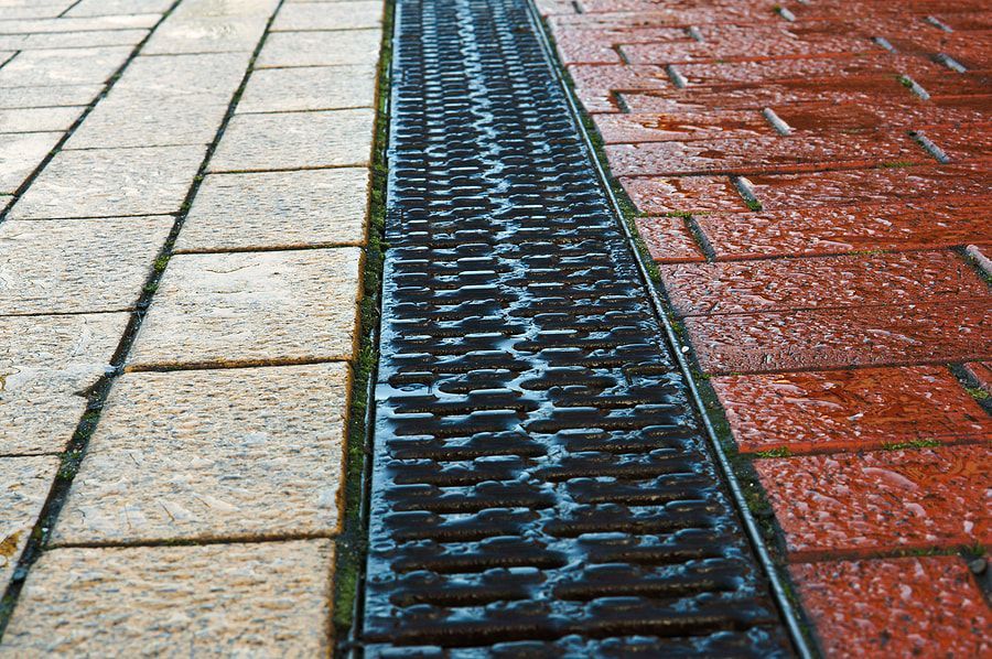 commercial drain on brick walkway