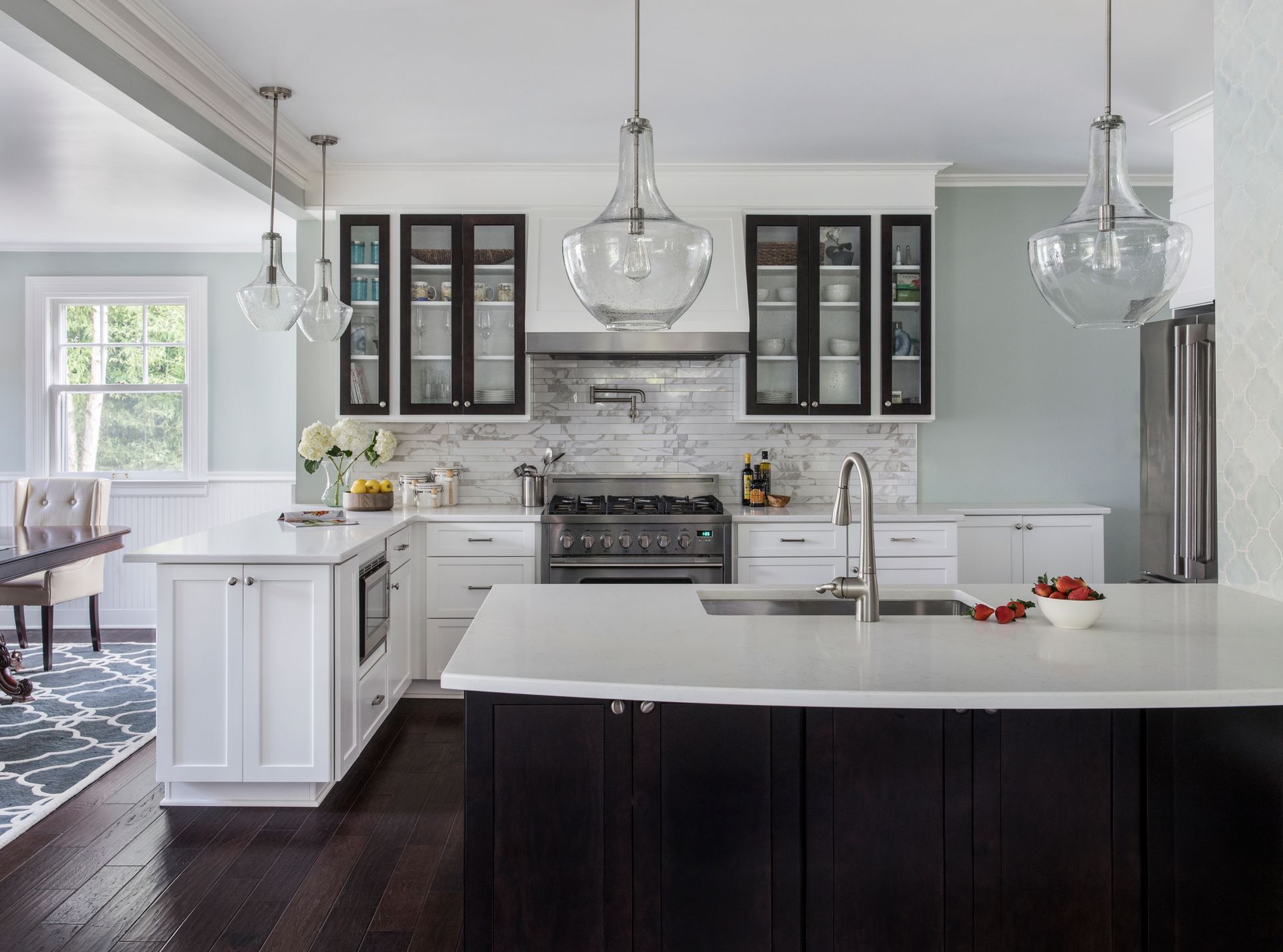 light blue kitchen with marble backsplash and white countertops Portland Oregon