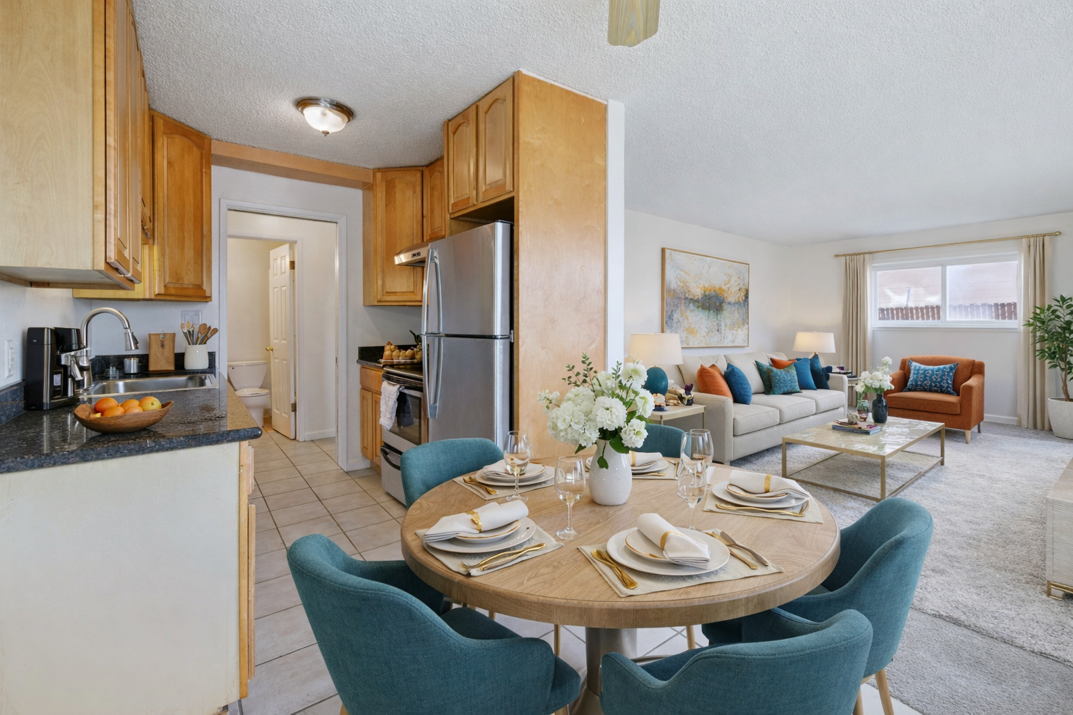 bright and open kitchen, dining room, and living room