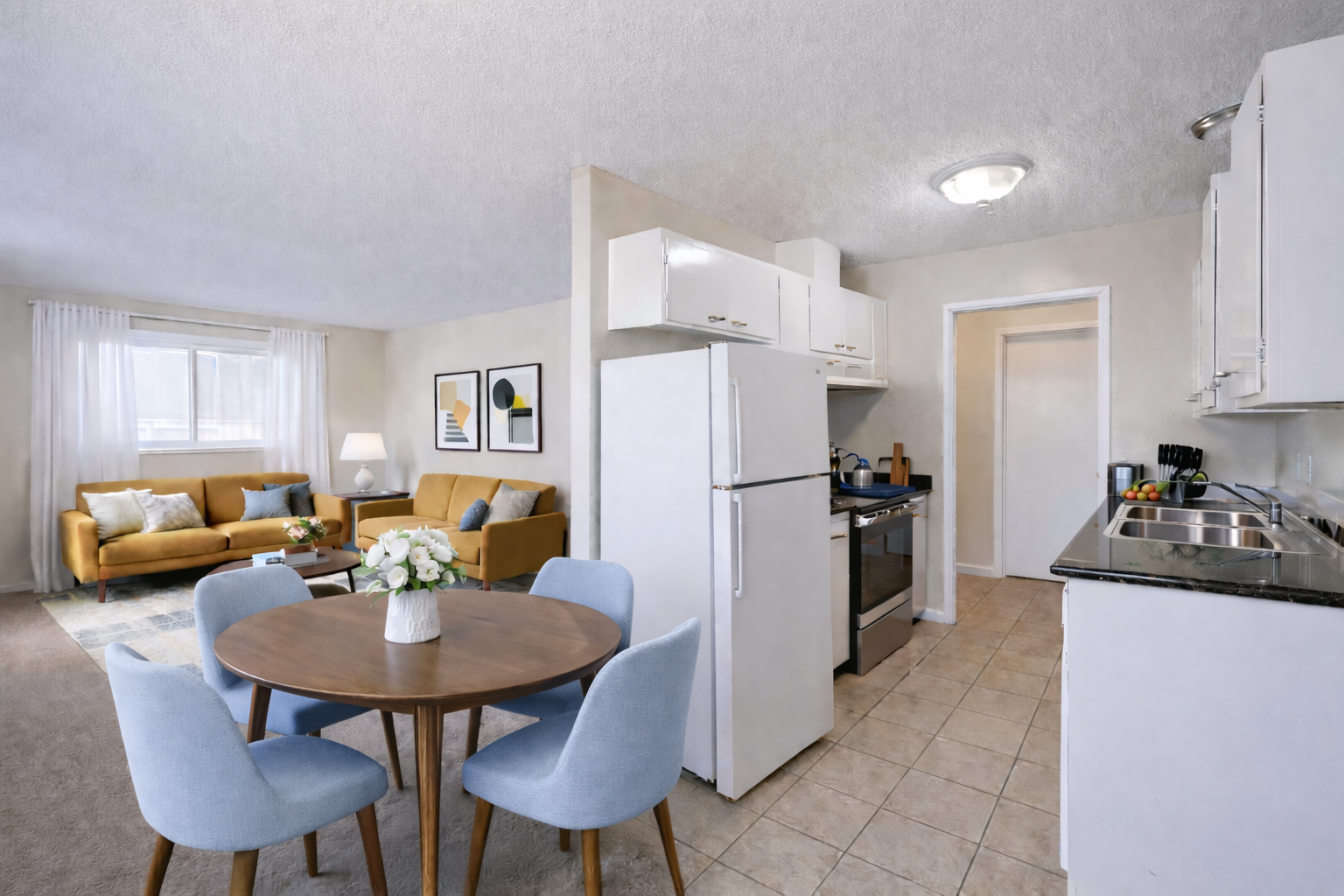 mid-century modern furnished living room and kitchen