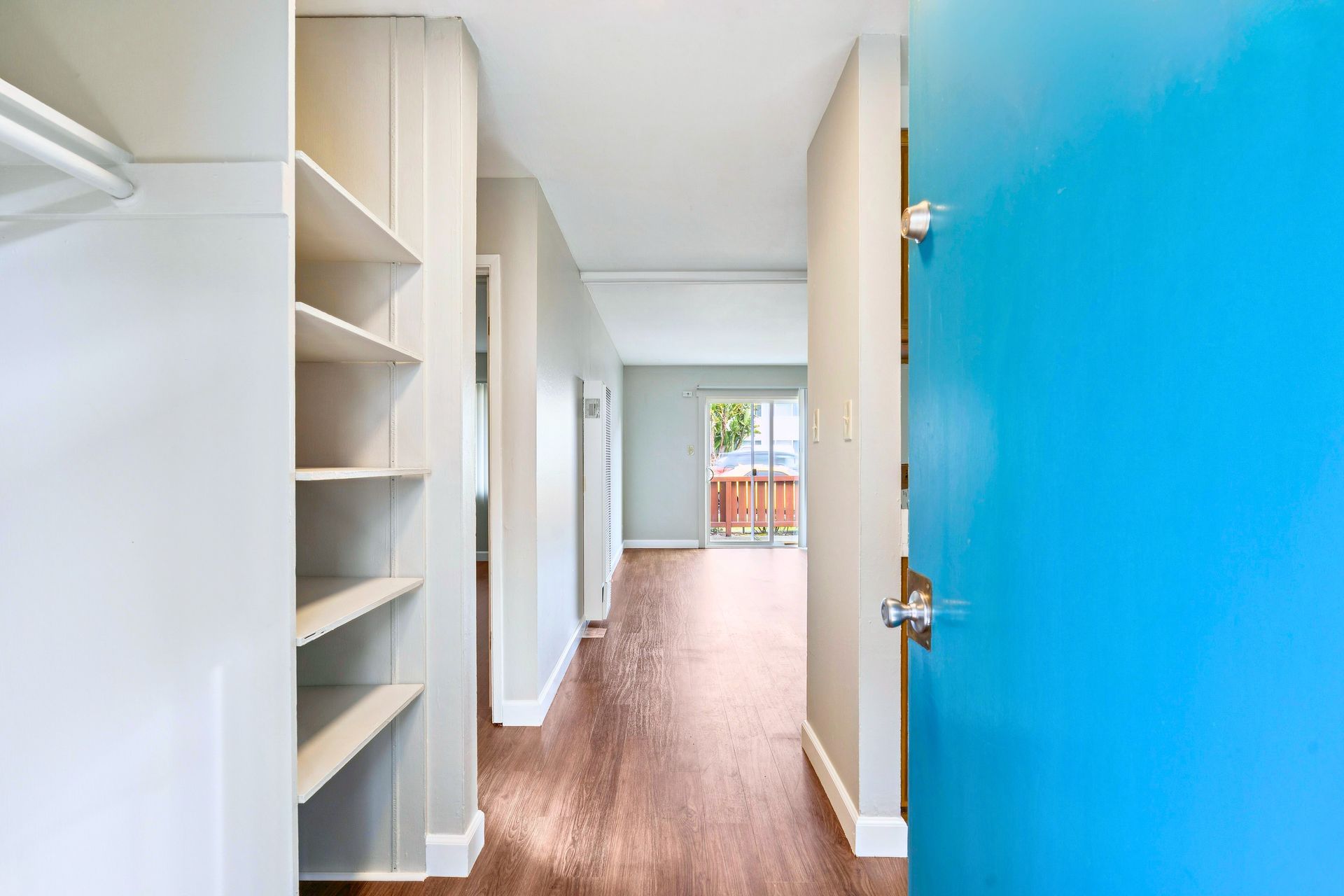 Entryway to 1 bedroom apartment with beautiful hardwood-like flooring