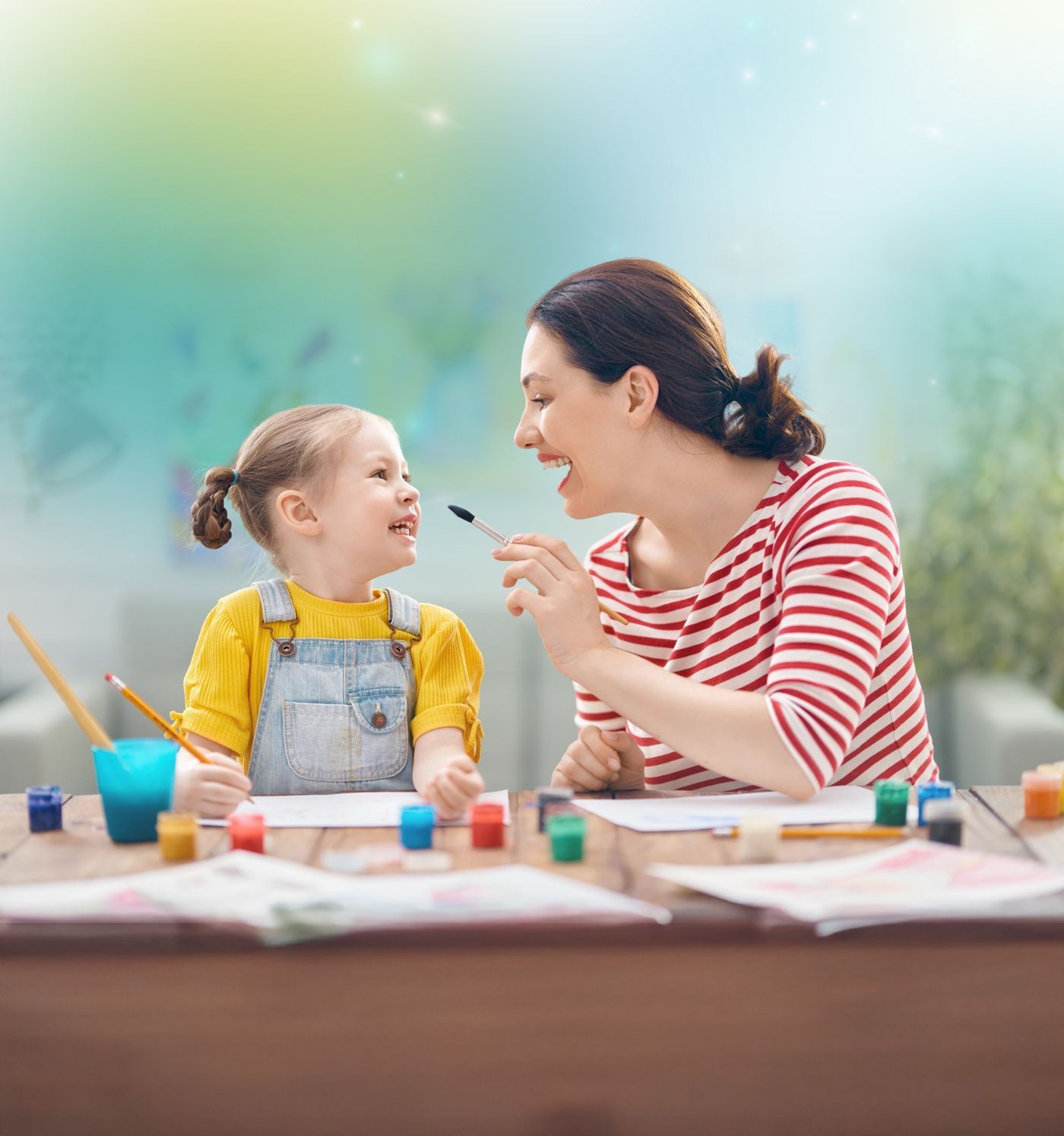 Parent and child smiling outdoors representing ABA family support