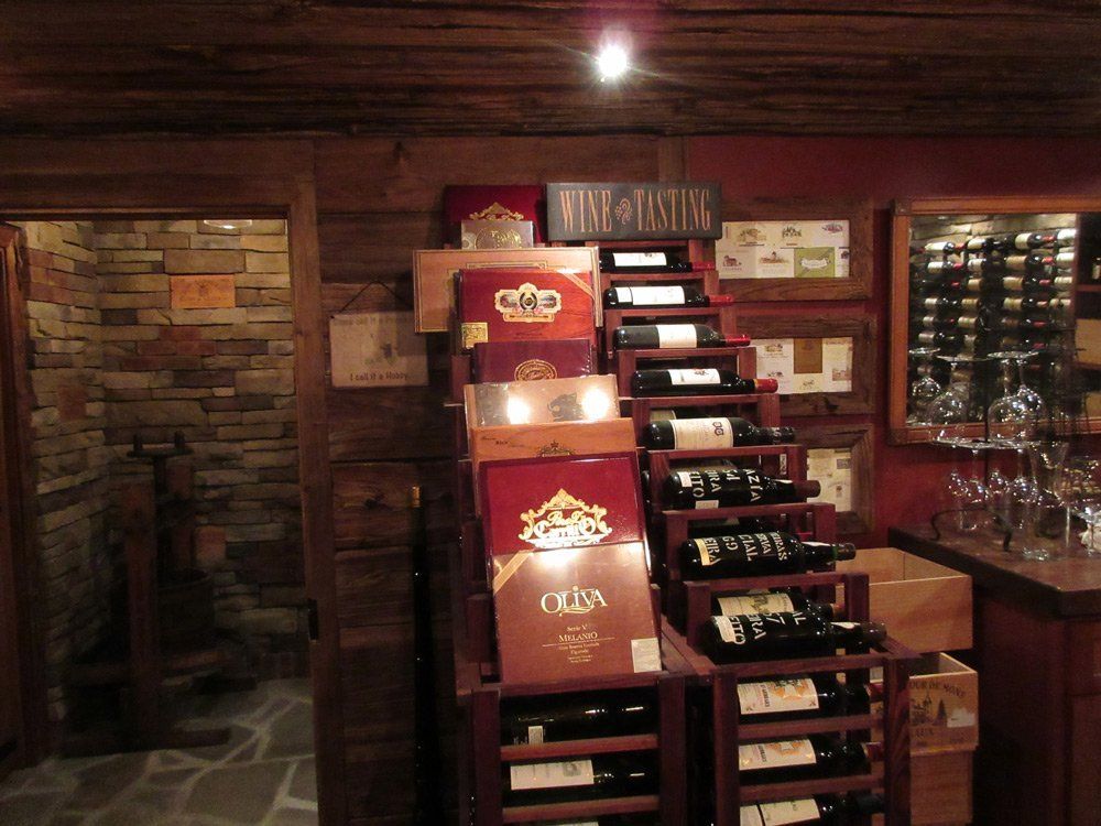 A wine cellar filled with lots of bottles of wine