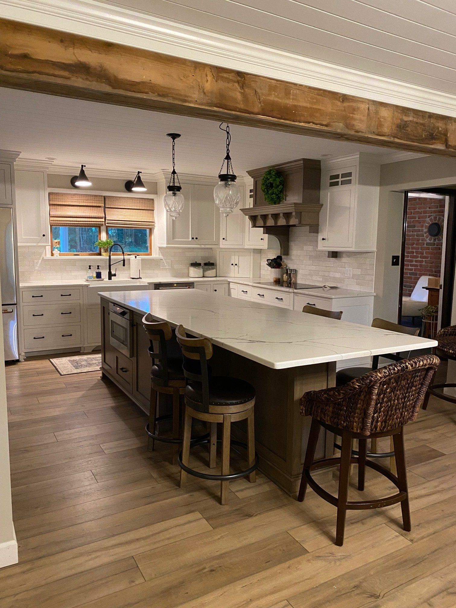 A kitchen with a large island in the middle of the room.