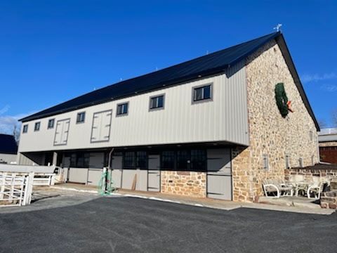 A large building with a wreath on the side of it
